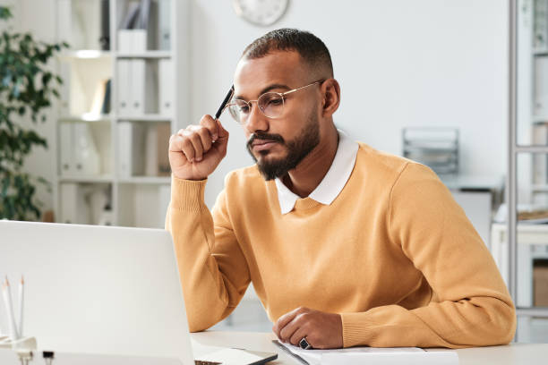 Image of Busy marketer working on strategy