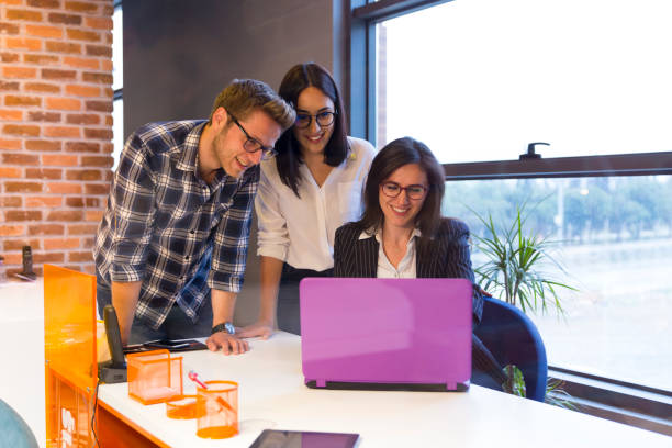 Image of people getting advice in office from business woman